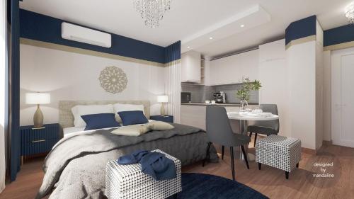 a bedroom with a bed and a table and a kitchen at Monarchia Apartman Sunny in Mosonmagyaróvár