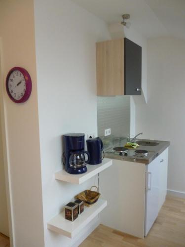 Kuchyň nebo kuchyňský kout v ubytování A10 Apartmenthaus