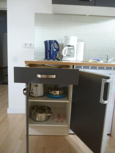 Kuchyň nebo kuchyňský kout v ubytování A10 Apartmenthaus