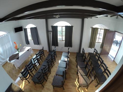 an overhead view of a room with chairs and a table at Hotel & Restaurant Fleur de Lis in Concepción de Ataco