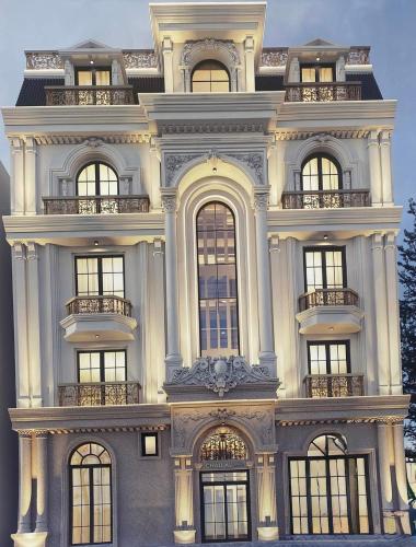 a large white building with many windows on it at Europa Hotel in Da Lat