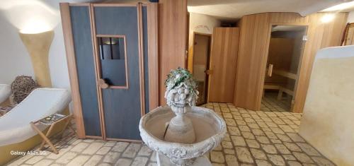 a bathroom with a large tub in a room at Pension Irlingerhof in Mondsee