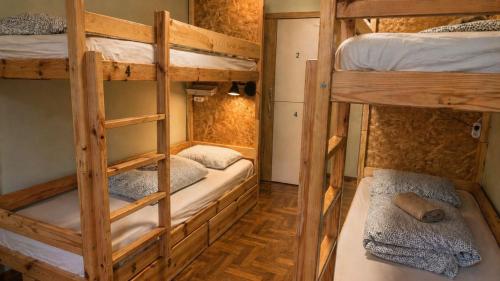 a bunk bed room with two bunk beds at For rest Hostel in Lublin
