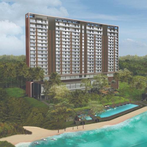 a rendering of a rendering of a hotel on a beach at Mövenpick Resort Carita in Serang
