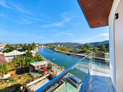 a view of a river from a balcony at Đức Loan Hotel Vĩnh Hy in Ninh Hải