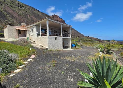a house on the side of a hill at FINCA LA JORADITA in Tamaduste