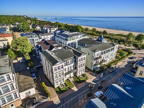 an aerial view of a city with buildings and the ocean at Villa Ahlbeck Haus 1 in Ahlbeck