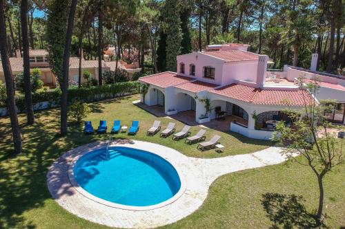 an aerial view of a house with a swimming pool at Villa Joselina by Algarve Holidays in Vilamoura