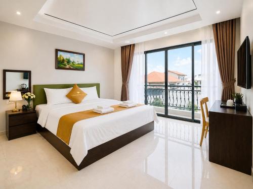 a bedroom with a large bed and a balcony at Sunrise Airport Hotel Noi Bai in Noi Bai
