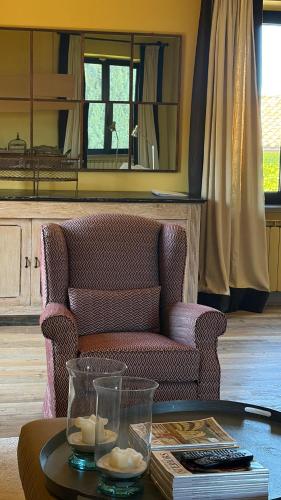 a living room with a couch and a coffee table at Tenuta San Filippo in Montalcino
