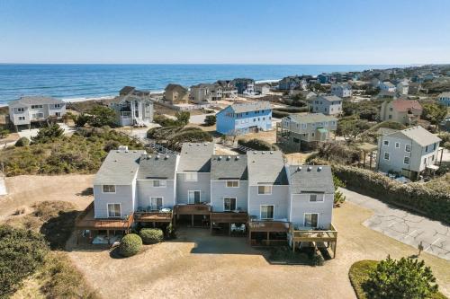 an aerial view of a house on the beach at 4203 - Here Comes the Sun in Duck