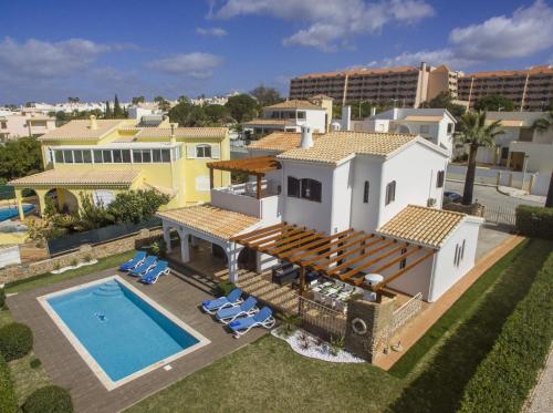 an aerial view of a house with a swimming pool at Villa Magali by Algarve Holidays in Galé