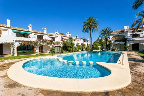 Apartamento Sol de Denia, dúplex con piscina y terraza cerca de la playa de la Marineta Casiana by Family Homes Rentals