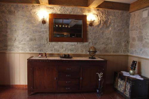 a bathroom with a sink and a mirror at Areeta Etxea - Espejo in Espejo
