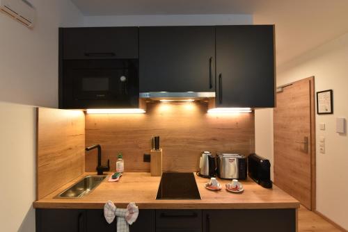 Foto myQuartier City Chalets digital self check in 2