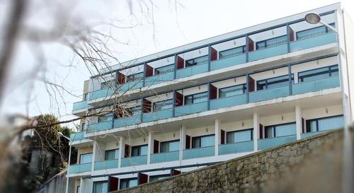 a tall building with balconies on top of it at Hotel Dom Afonso - Monção in Monção