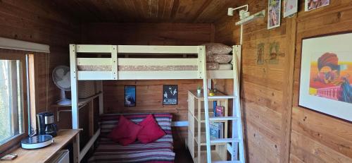 a room with two bunk beds in a cabin at WoodHouse Near River - Near Ocean - Near Porto in Porto