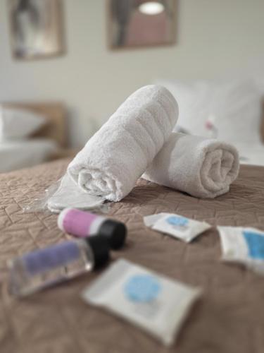 a roll of toilet paper on top of a table at Peramos Sea View in Nea Peramos