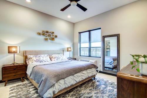 a bedroom with a bed and a ceiling fan at Fairway in Altoona