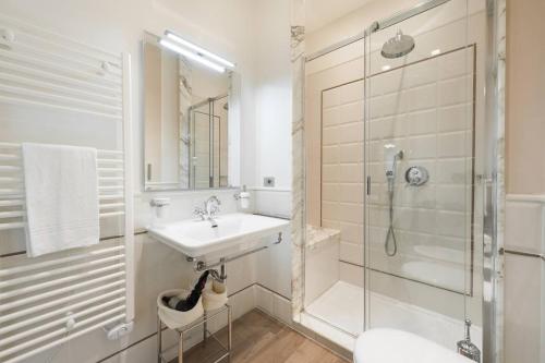 a bathroom with a sink and a shower at Appartamenti Fortezza Da Basso in Florence