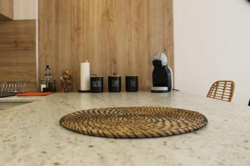 a counter top with a tray on top of a counter at Le Chevalier I - L'Écrin Alsacien in Sélestat