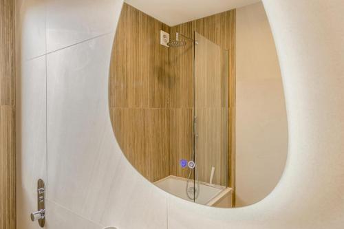 a bathroom with a shower and a mirror at 3 Bed in Pitlochry oc-t37864 in Pitlochry