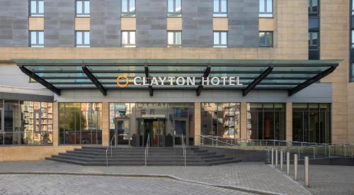 a building with a sign on the front of it at Clayton Hotel, Leeds in Leeds