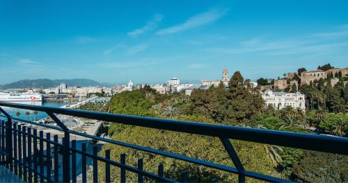 a view of a city from a balcony at Hotel MS Maestranza Málaga Centro in Málaga
