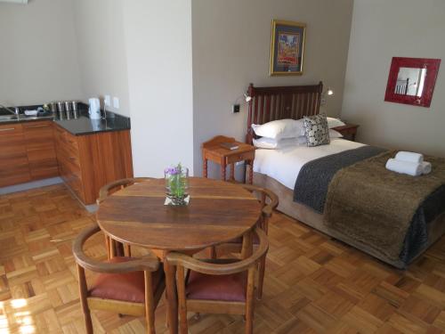 Ένα ή περισσότερα κρεβάτια σε δωμάτιο στο Dias Guest House