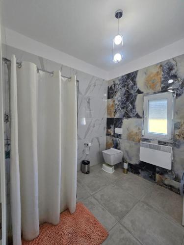 Koupelna v ubytování Villa Ndoni
