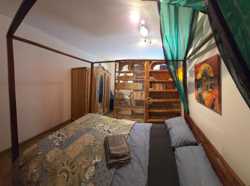 a bedroom with a bed in a room at Surya Villa Holistic Stay Prenzlauer Berg in Berlin