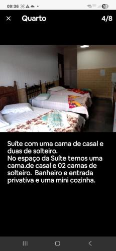 a picture of two beds in a room at Suave recanto in Ouro Preto