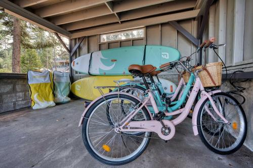 two bikes parked in a garage with a trailer at Luxurious 7BR Walk 2 Beach and Bus Stop in Carnelian Bay