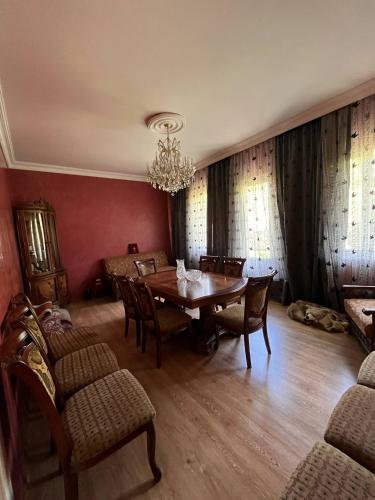 a dining room with a table and chairs at Rest house Keda in K'eda