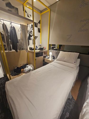 เตียงในห้องที่ C ZooN