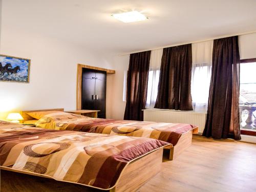 Una cama o camas en una habitación de Apel Luxury
