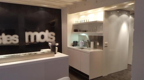 a store with a mos sign on the wall at Fontaine in Geneva