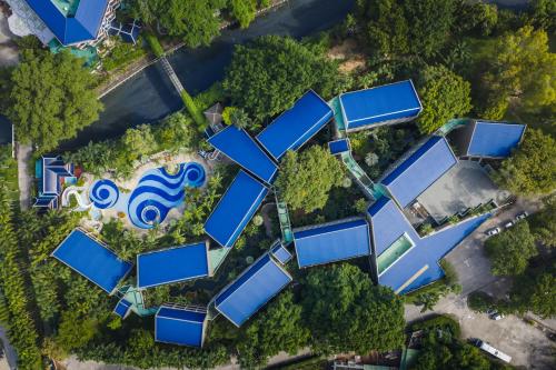 an overhead view of a house with blue roofs at Siam Bayshore Resort Pattaya in Pattaya South