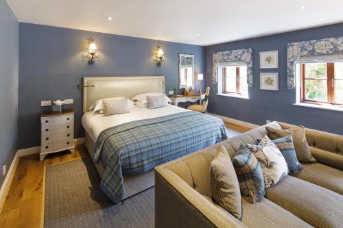 En eller flere senge i et værelse på Greenhills Country Hotel