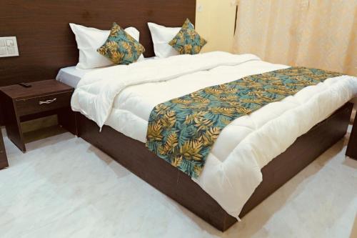 a large bed in a hotel room at Hotel Ramkrishna Stay in Khajurāho