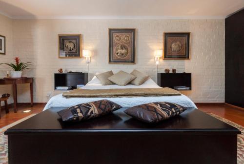 Ένα ή περισσότερα κρεβάτια σε δωμάτιο στο The Garden View Suite
