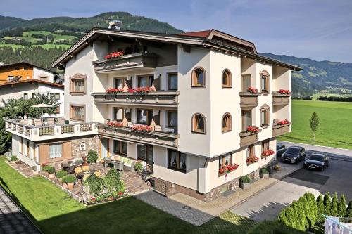 an aerial view of a large white building at hin&weg das Aparthotel in Ried im Zillertal