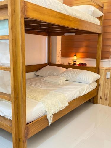 a bunk bed room with two bunk beds at Spacious Bunk Bed & Dedicated Workspace in Baler