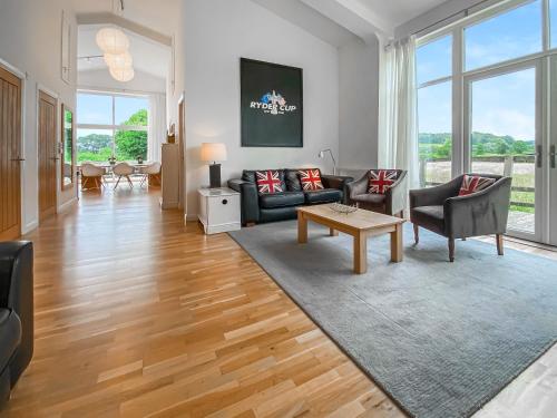 a living room with a couch and a table at Yew Tree Barn - Hw7737 in Usk