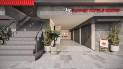 a rendering of a lobby with stairs and cactus at SHANKEE Hotel Melawai Blok M Jakarta in Jakarta