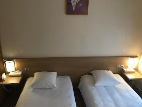 Postel nebo postele na pokoji v ubytování Tipi