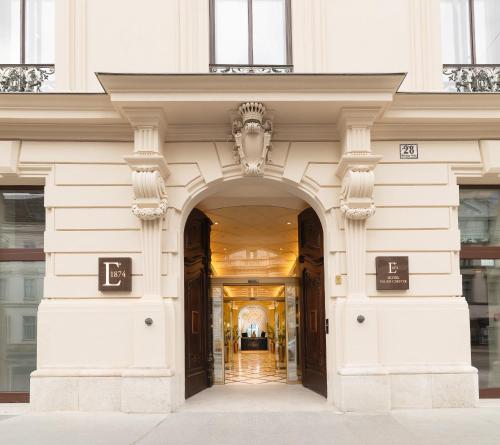 an entrance to a building with an archway at EST Hotel Palais Chotek NEW OPENING in Vienna