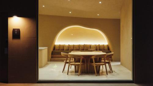 a dining room with a table and chairs at THE THIRD PLACE Mt Fuji in Fujikawaguchiko