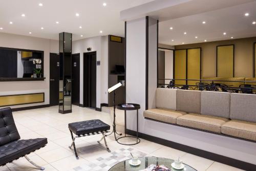 Χώρος καθιστικού στο Hotel Paris Italie