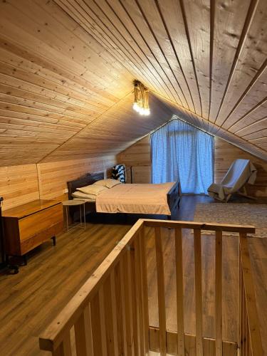 a bedroom with a bed and a desk in a room at Tsemi Aura in Tsemi